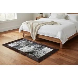 Rectangle Patchwork Rug Runner – Black & White Speckled Cowhide with Bison Leather Border (2' x 3')