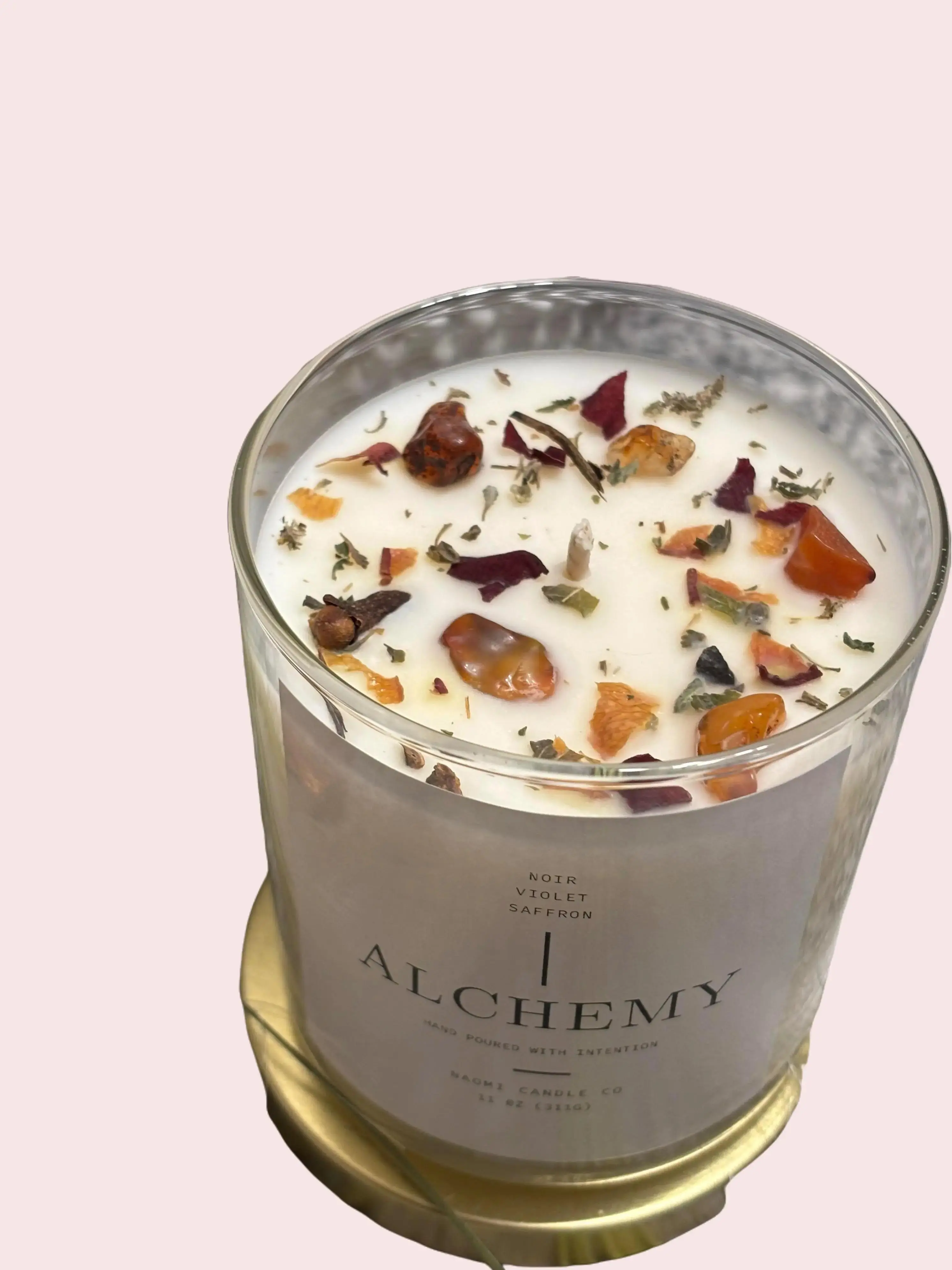 The Alchemy Candle By Naomi Candle Co. crafted with Carnelian, Rose and clove