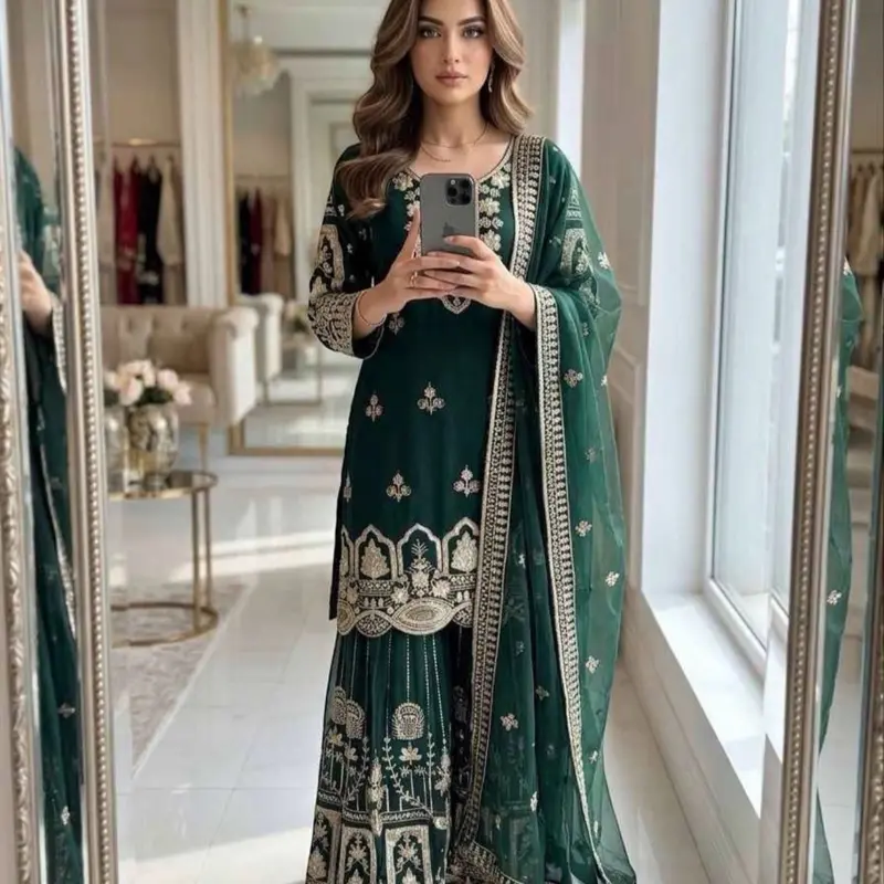 Green Georgette Sharara Suit With Sequin Work Elegant green georgette sharara suit highlighted with zari and sequins embroidery