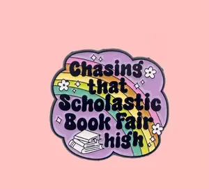 Chasing That Scholastic Book Fair High Enamel Pin