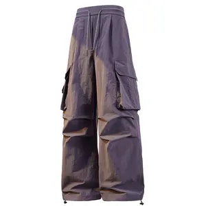 Outdoor tactical cargo pants for men and women, spring retro loose straight-leg design with a drapey feel; drawstring elastic waistband; high-street workwear style; youth fashion athletic long pants made from comfortable, breathable fabric—suitable for ev
