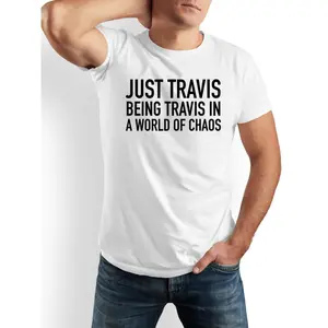 Funny Travis T-Shirt - "Just Travis Being Travis" Bold Text Crew Neck Tee - Soft Everyday Shirt for Men, Dad Gifts, Travis Fans - Machine Washable Casual Apparel in Black/White - All-Season Comfort Fit