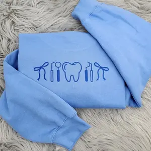 EMBROIDERED Delicate Dental Crewneck Sweatshirt, Hygienist & Dentist Gift, Coquette Bow Tooth Design, Cute Dental Aesthetic Sweater, Pink Girly Medical Apparel, Cozy Unisex Pullover, Dental Office Wear