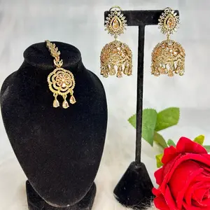 Premium Quality Unique Ad Jhumka And Tikka Set with Intricate Design and Elegant Gold Finish