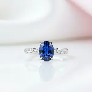 Twist Blue Sapphire Oval Cut Simulated Diamond Option Engagement Ring
