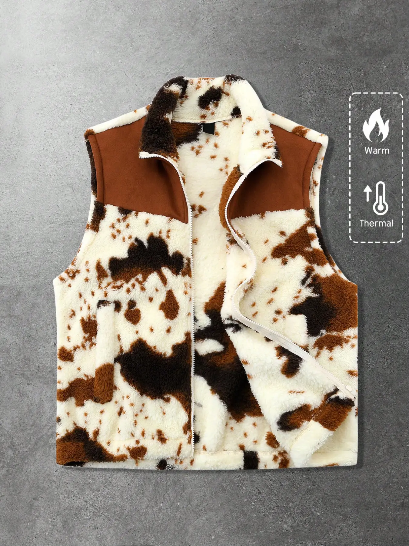 This men's streetwear fleece sleeveless gilet vest features a graphic cow print and patchwork design, creating a casual streetwear style that's perfect for fall and winter.