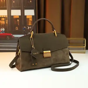 Autumn and winter 2025 new handbag lychee pattern fabric with imitation suede fabric women's bag high-end fashion versatile messenger bag commuter bag