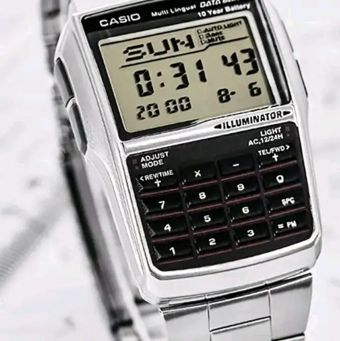 DBC-32D-1A   Casio Silver Digital Watch w/ Databank, Calculator, Alarm & Light -