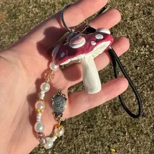 Hand sculpted, painted, and beaded keychain