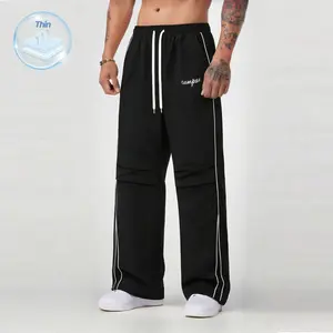 Men's straight-leg pants with striped pockets on the side, casual street embroidered letter-hemmed pants, men's bottoms suitable for daily wear, suitable for all seasons