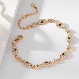 Chic Gold Evil Eye Link Bracelet with Sparkling Crystals | Mysterious Trendy Fashion Jewelry for Women | Adjustable Everyday Wear Accessory