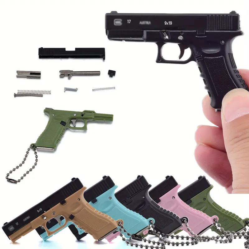 1-Piece Classic 1:3 Scale Glock G17 Miniature Keychain – Tactical Military-Themed Mini Keychain Pendant. Exquisitely crafted with high wear resistance, superior hardness, and durable metal construction. Gaming Collectors