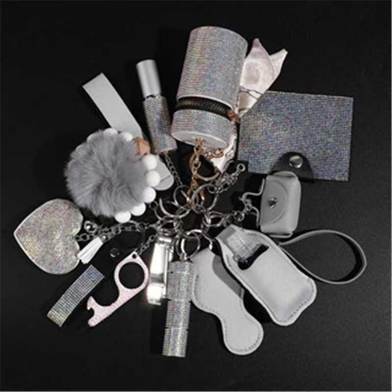 NewDesignHotWholesaleRhinestoneWomenSelf-DefenseAnti-WolfKeychain17pcsSetPompomsAlarmSelfDefense