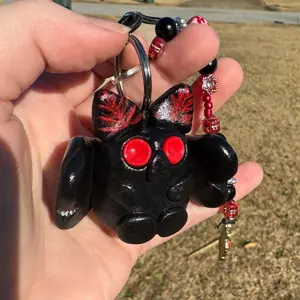 Hand sculpted, painted, and beaded keychain