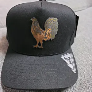 Gorra gallo dorado color obscura  marca kamel