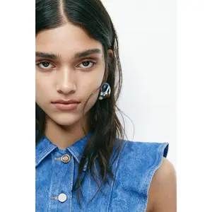 H&M Flounce-trimmed denim waistcoat