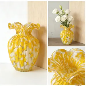 One glass vase, orange wavy home decor piece suitable for family living rooms, studies, Christmas, and holiday decorations; ideal for modern home styling across multiple settings and enhances the home’s atmosphere.