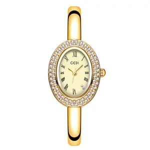 Women's Iced Out Dainty Vintage Gold Bangle Watch Rhinestone Oval Dial Roman Numerals Waterproof Quartz Bracelet Watch for Daily & Office Looks