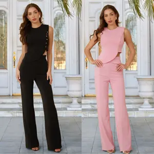 TWO PIECE SETS - UNEVEN ANGLE CROP TOP WITH STUDS - SLEEVELESS WITH ROUND NECKLINE - ZIPPER ON THE SIDE - SOLID FLARE PANTS