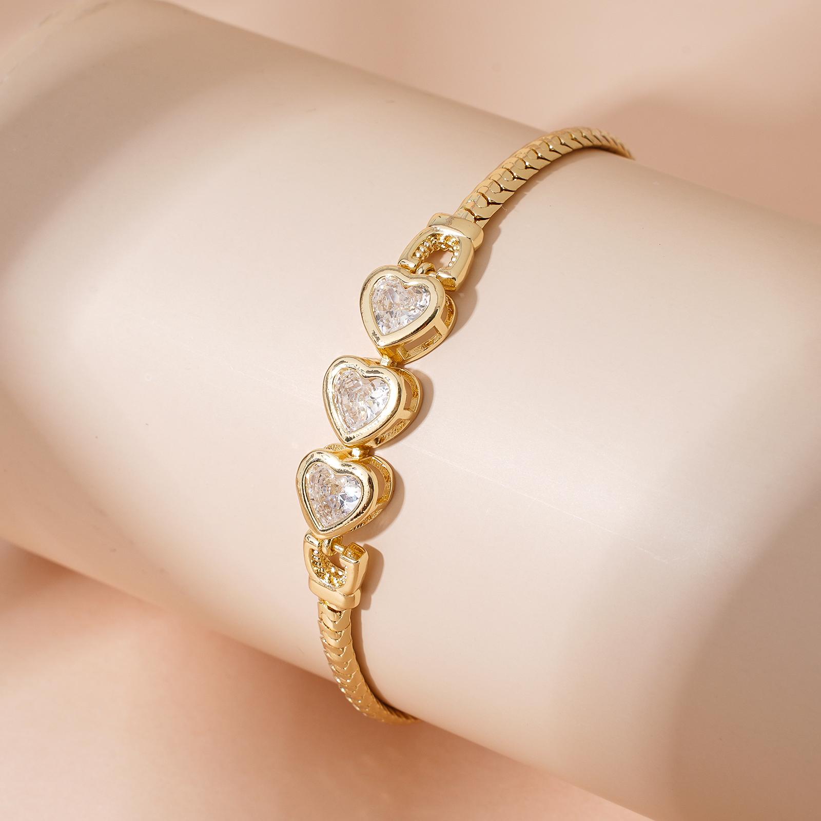 MEIITRUE 14K Gold Plated Snake Chain Bracelet for Women, Dainty Heart Zirconia Bracelet, Fashion Jewelry for Mother's Day Gifts and Everyday Wear MEIITRUE 14K Gold Plated Snake Chain Bracelet for Women, Dainty Heart Zirconia Bracelet, Fashion Jewelry for Mother's Day Gifts and Everyday Wear