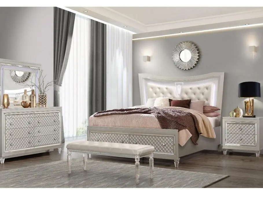 Elegant Tufted bedroom set. This elegant set comes with 5 pieces, a Bed, a Night stand, a Mirrored dresser, and a chest.