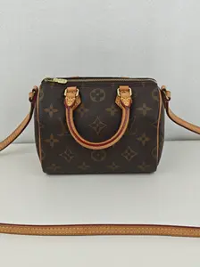 Pre-owned Monogram coated canvas Shoulder Bags Louis Vuitton Brown Nano Speedy Gold Hardware