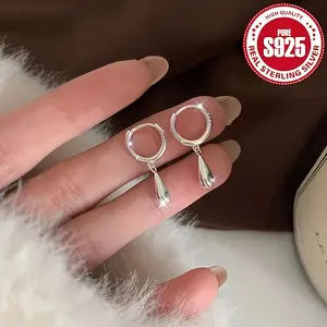 Minimalist teardrop pendant earrings that highlight a unique temperament and fashion appeal. Exquisitely crafted elegant drop earrings for women, showcasing an extraordinary sense of delicacy.