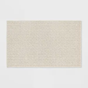 2'6"x3'10" Washable Solid Machine Tufted Accent Rug Tan - Threshold