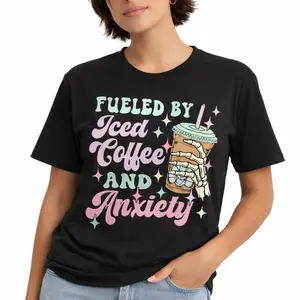 Graphic tees for women cute tops – Oversized black T-shirt with fun 'Fueled by Iced Coffee and Anxiety' print, t shirts women's graphic tees, vintage graphic tees, casual streetwear style