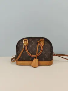 Pre-owned Monogram coated canvas Clutches & Wristlets Louis Vuitton Monogram Canvas Alma BB Satchel Handbag