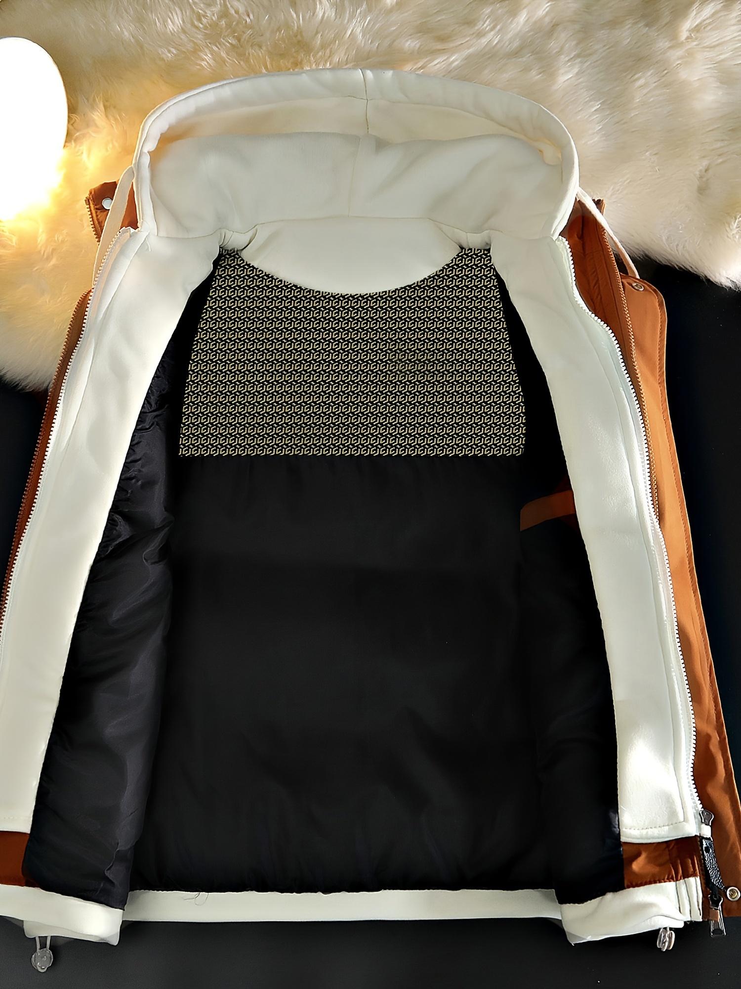 Unisex winter gilet in caramel, hooded, worn open over a long sleeve top