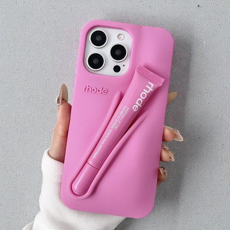 Rhode Lip Tint Silicone Phone Case with Lip Gloss Holder for iPhone 11-17 Shockproof Design Smooth Application Fashionable Protective Nutrients Convenient Daily Use