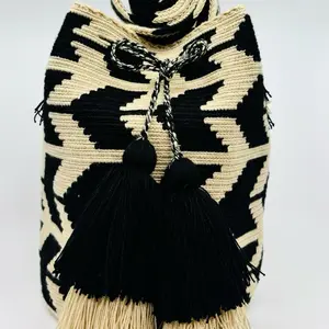 Handmade Bag with Black and White Zigzag Pattern and Tassel Accents for Stylish Everyday Use