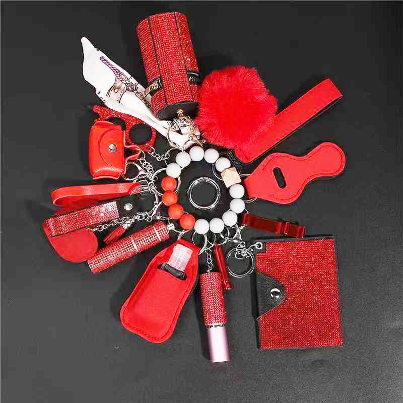 NewDesignHotWholesaleRhinestoneWomenSelf-DefenseAnti-WolfKeychain17pcsSetPompomsAlarmSelfDefense