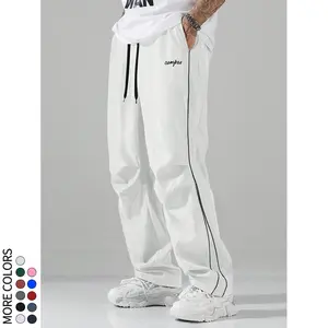 Side-striped high-street loose-fit drawstring straight-leg joggers, available in multiple colors, featuring embroidered lettering; relaxed, drapey, breathable, quick-drying wide-leg pants for casual wear.