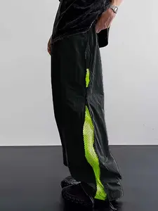 Vibrant Neon Mesh Panel Wide-Leg Pants with Zipper Detailing - Urban Streetwear Just-Have