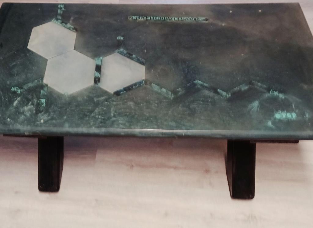 Cross Legs epoxy table featuring the tetrahydrocannabinol compound in multiple layers of epoxy providing a deep tridemtional feel