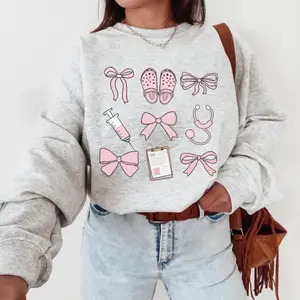 Coquette Nurse Shirt, Pink Bow Nurse Sweatshirt, Girlcore Nurse Sweater, Softcore Nurse Graduation, Girly Nurse Birthday Gift, New Nurse Tee