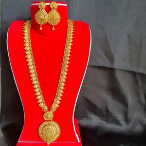 Gold tone raanihaar long necklace with matching earrings for women