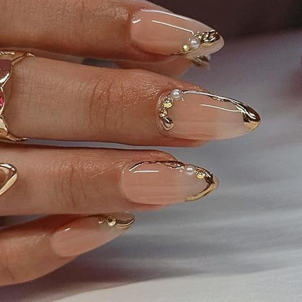 Short Description: Chic french tip slim gold line fake nails, 24pcs medium almond press ons. Waterproof & , fit most nail sizes, ideal for women work, date and daily wear. Luxury Reusable