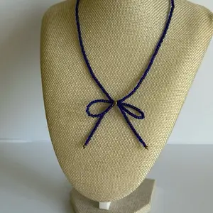 Blue bow necklace