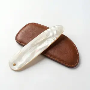 Handcrafted Natural Seashell Gua Sha Facial Massage Tool - Artisanal One-of-a-Kind Pieces Bearing the Mark of Skilled Artisans, Telling the Story of the Sea. Limited Edition, Available for 48 Hours Only in a Run of 30 Units.