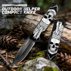 Outdoor folding pocket knife, cutting knife for meat, V‑shaped blade, 3D skull pattern, black and white color scheme, classic and simple design, stainless steel material, suitable for home, camping, barbecues, and fishing; an excellent gift for friends.