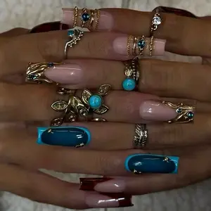 SHEDARES Blue Opal – Luxury Nude Press-On Nails with sculpted liquid-gold frames, glossy gemstone accents, and modern square tips for Bridal, Proms & Elegant Nights