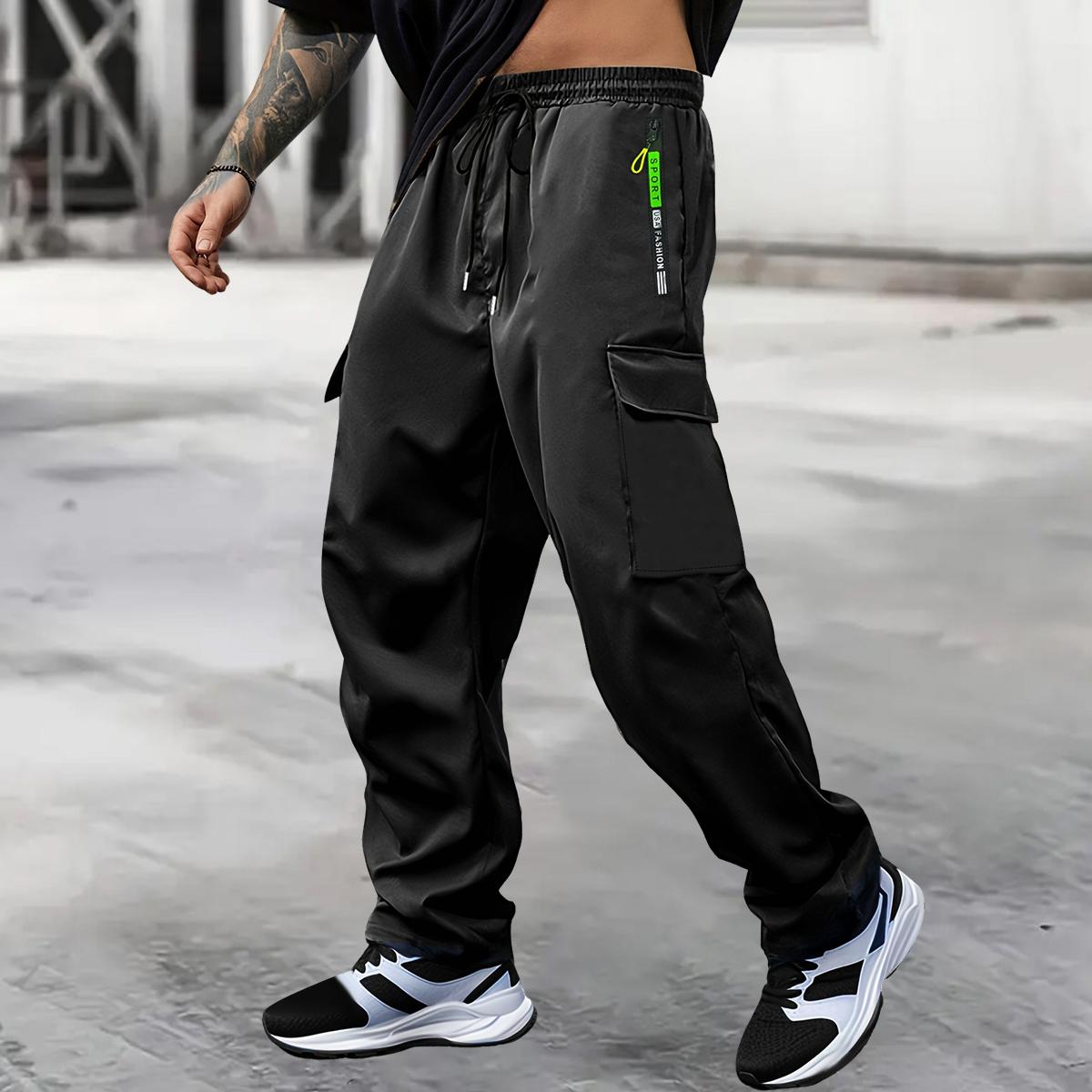 Men's spring-autumn style letter green zipper pocket work pants with fashionable large patch pocket design with drawstring elastic waist, suitable for jogging, hiking and daily wear. Valentine's Day gift.
