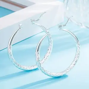 Silver Hoops That Hit Different Classic Design Statement Piece Versatile for Casual & Formal Occasions Unmatched Style