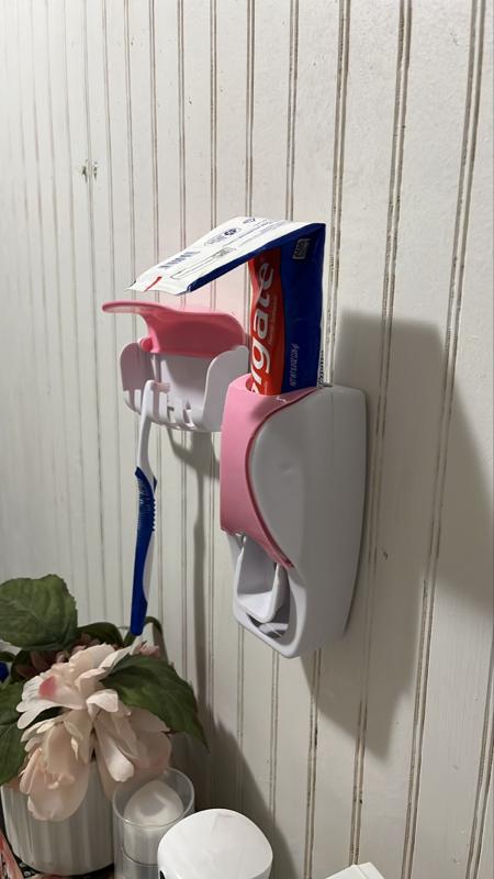 Toothpaste squeezing dispenser and toothbrush holder