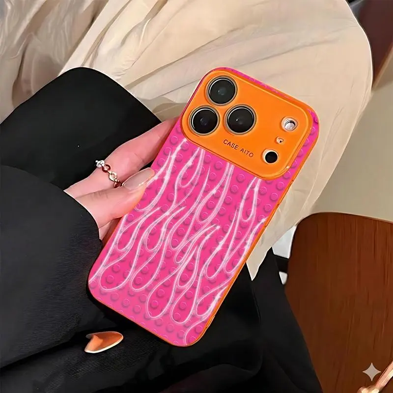 LEGO-inspired phone case. Compatible with iPhone 17 Pro Max, 16 Pro Max, 15 Pro Max, and 14 Pro Max. Includes lens protection. Also compatible with iPhone 15, 14, 13, and 12. Made of skin-friendly TPU material.