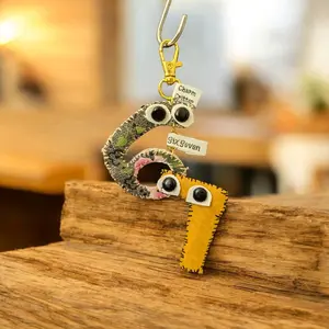 Charm Critter Six Seven Keychain - Adorable Fabric Critter with Gold Clip and Unique DesignSix and Seven are an inseparable duo who appeared one stitch apart and decided that was close enough forever. Six is the thoughtful one—quiet, observant, and always