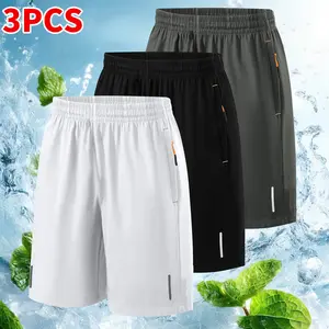 Men’s three-piece athletic shorts set featuring an elastic, breathable waistband design—a stylish fitness essential, ideal for beach and outdoor activities, equipped with pockets and a stretchy waistband.